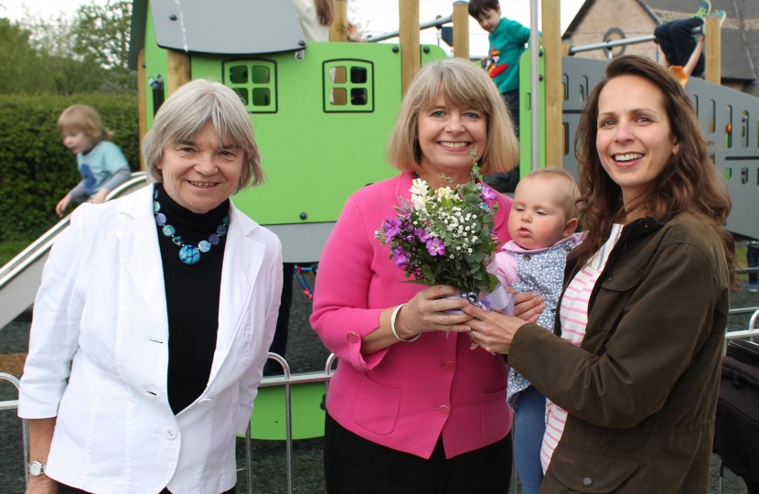 Welland parish council chair Viv Nelson, Harriett Baldwin MP and parish councillor Emma Horton-Smith with seven month old daughter Amber